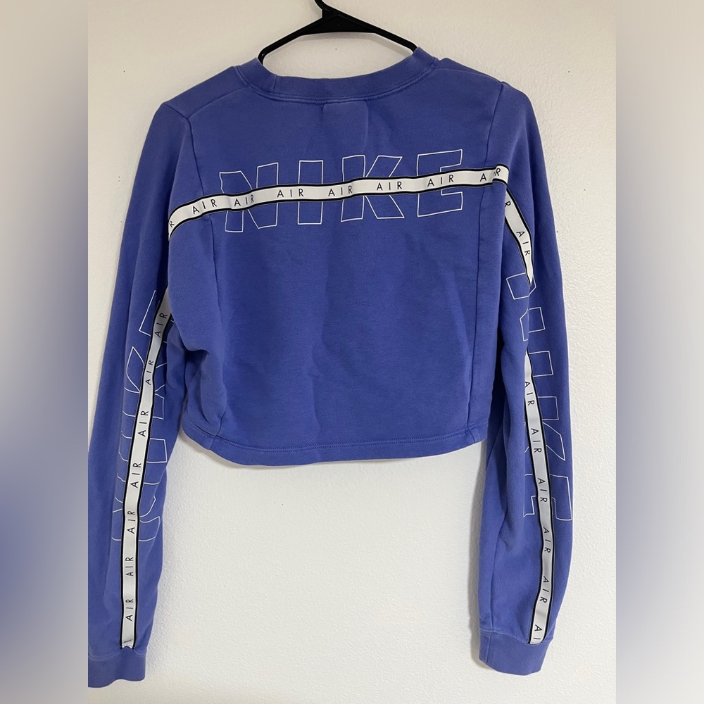 Purple Nike crop crew neck size small in good condition worn I few times